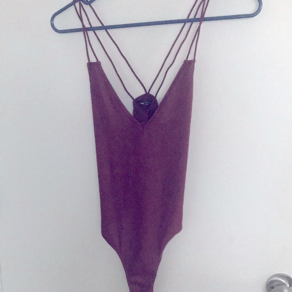 Size X-Small Body suit